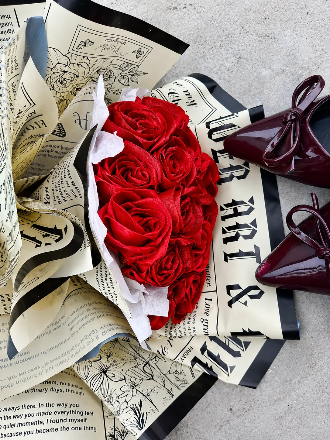 Handmade bouquet hamper featuring satin roses and photo cards